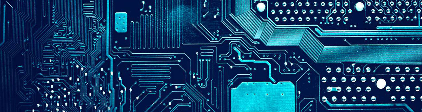 A detailed view of a circuit board featuring intricate electronic pathways and components.