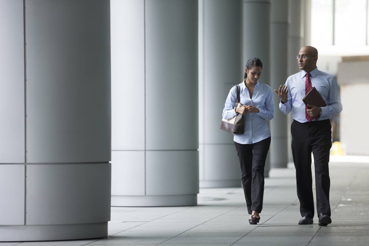 Business Colleagues Walking Outdoors