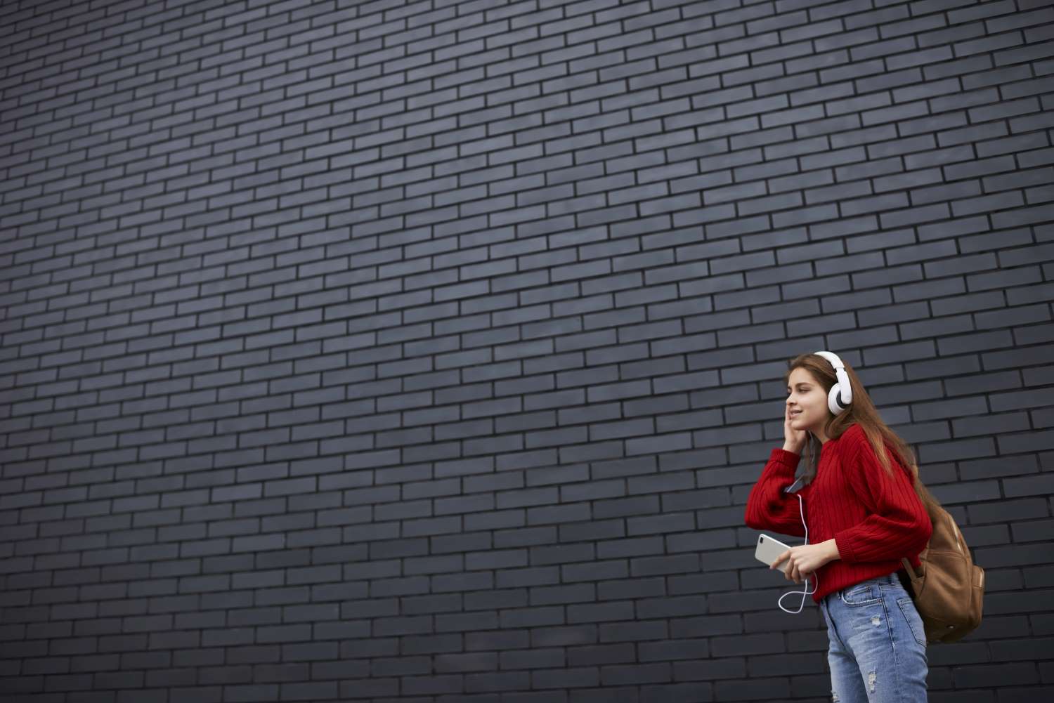 Casual Woman Listening To Music